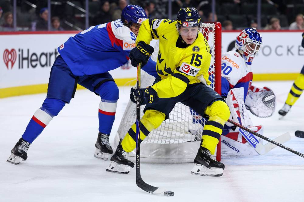 Matt Krohn / THE ASSOCIATED PRESS FILES
Swedish forward Ivar Stenberg (15) is predicted No. 2 NHL draft selection.