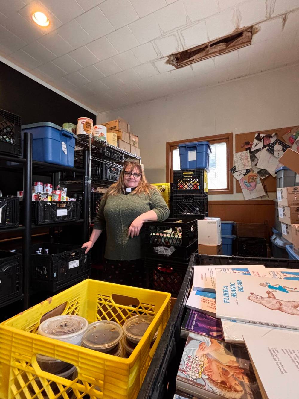 John Longhurst / Free Press
Deacon Cassandra Golondrina stands beneath a hole in the roof at St. Thomas Anglican Church.