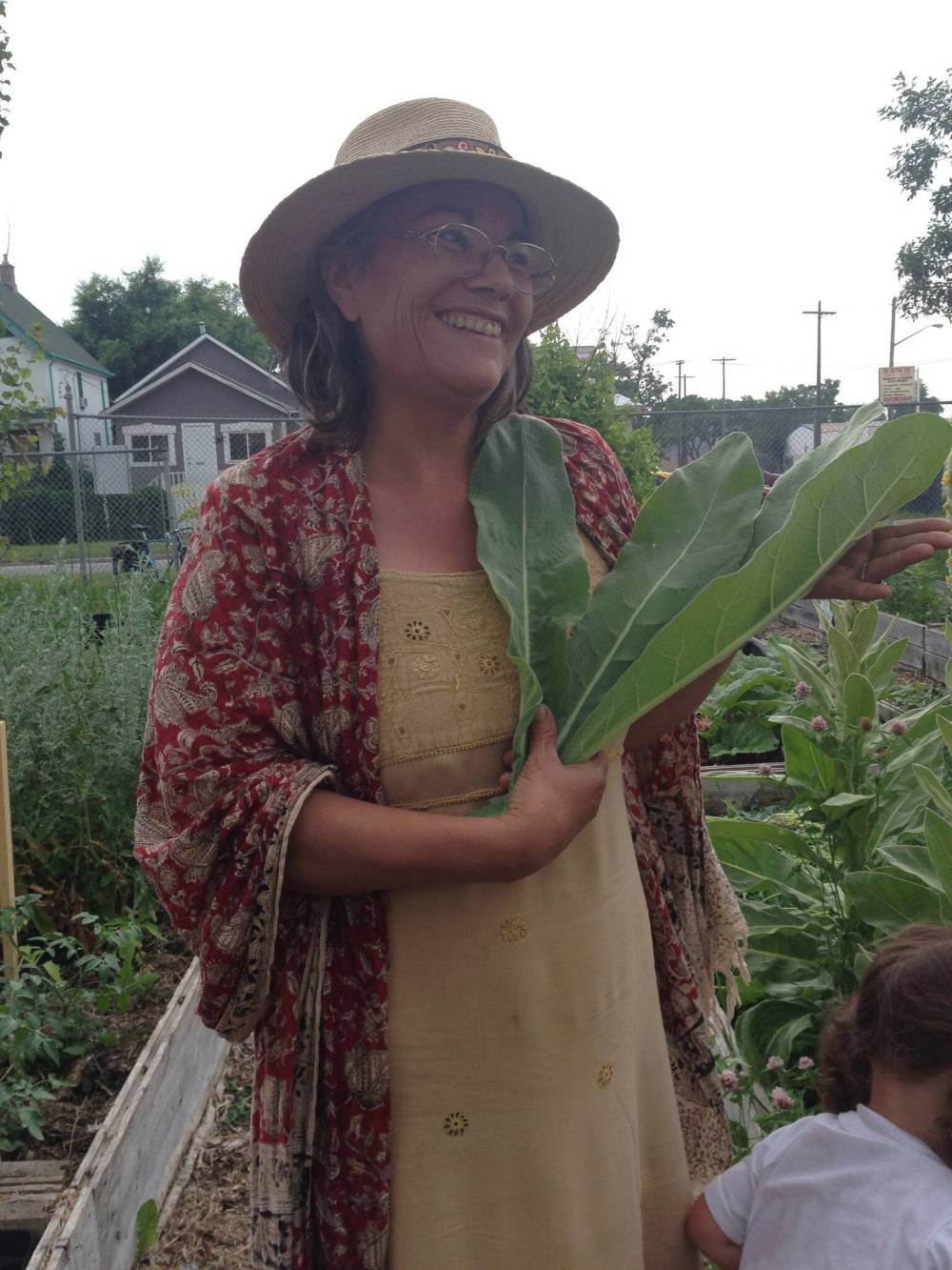 SUPPLIED
Audrey circa 2015 in the Dufferin School
garden holding comfrey, one of her favourite workhorse plants.