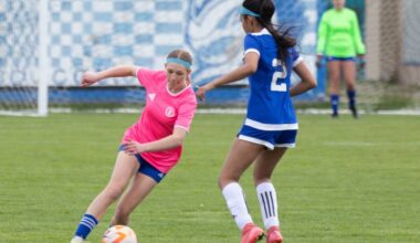 Maddie Waldegger of the Seaton Sonics (left) dribbles around a Queen Elizabeth Royals defender from Surrey during action at the Okanagan Classic Senior Girls High School Soccer Tournament April 23-24 in Vernon. (Laurie Stinn Photo)