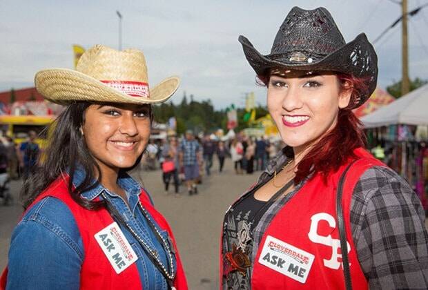 Anmol Cheema and Sierra Pilcher are seen as &ldquo;Ask Me&rdquo; ambassadors during a previous rodeo and fair. The Rodeo now calls the ambassadors &ldquo;Wranglers&rdquo; and Rick Hugh says they&rsquo;ll be able to answer all scavenger hunt-related questions for kids. (Black Press Media file photo)