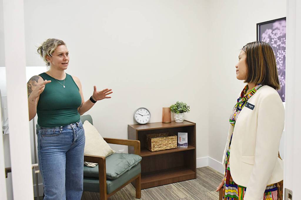 Nichole Olsen (left), program manager with Cythera Transition House Society, gives a tour to Coun. Jenny Tan, at the grand opening of Elyra Counselling, launched by Cythera Anti-Violence Society to provide personalized, trauma-informed therapy in a safe, inclusive, and compassionate environment for women. (Colleen Flanagan/The News)