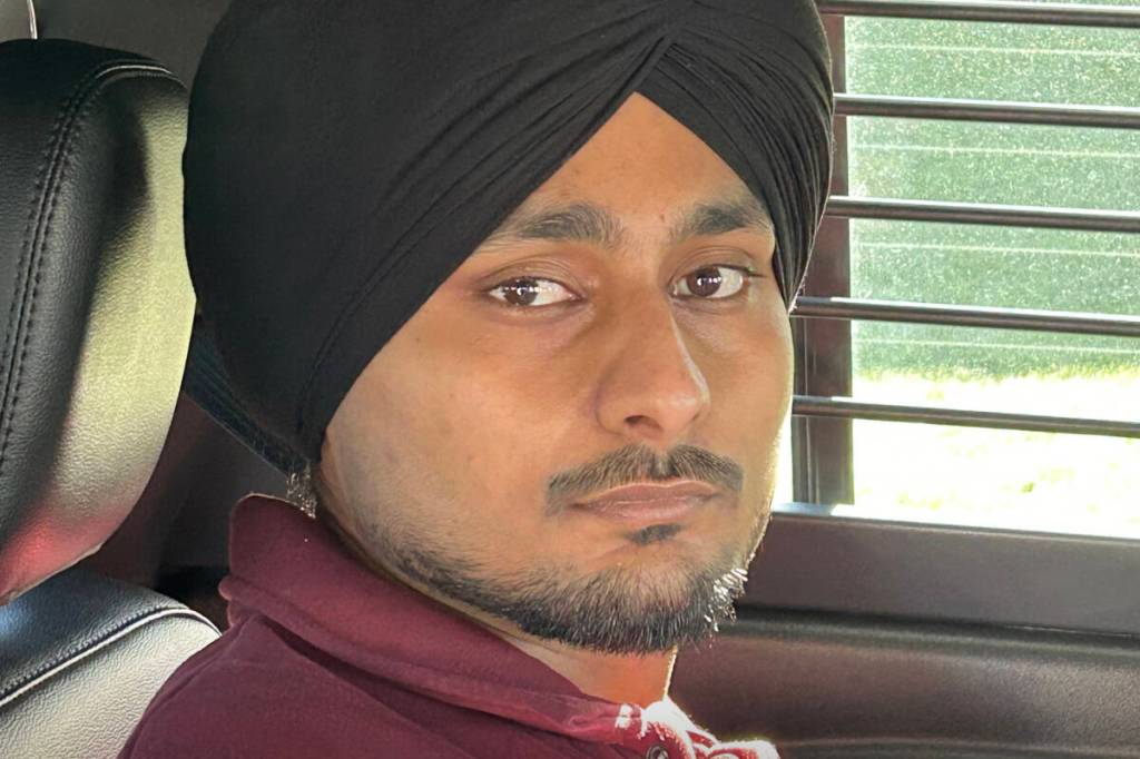 Surrey Police Service has released a photo of Prabhjot Singh, believed to be involved in the ongoing extortion crisis, in the hopes of learning more about his associates and activities while in Canada. Singh has been removed from the country. (Surrey Police Service/Contributed to Peace Arch News)