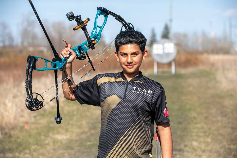 BROOK JONES/FREE PRESS
12-year-old Laganjot, the two-time reigning national U13 indoor compound champion, was drawn to a bow and arrow shortly after watching his sister, Khushreet, who he says he really wanted to get better than.