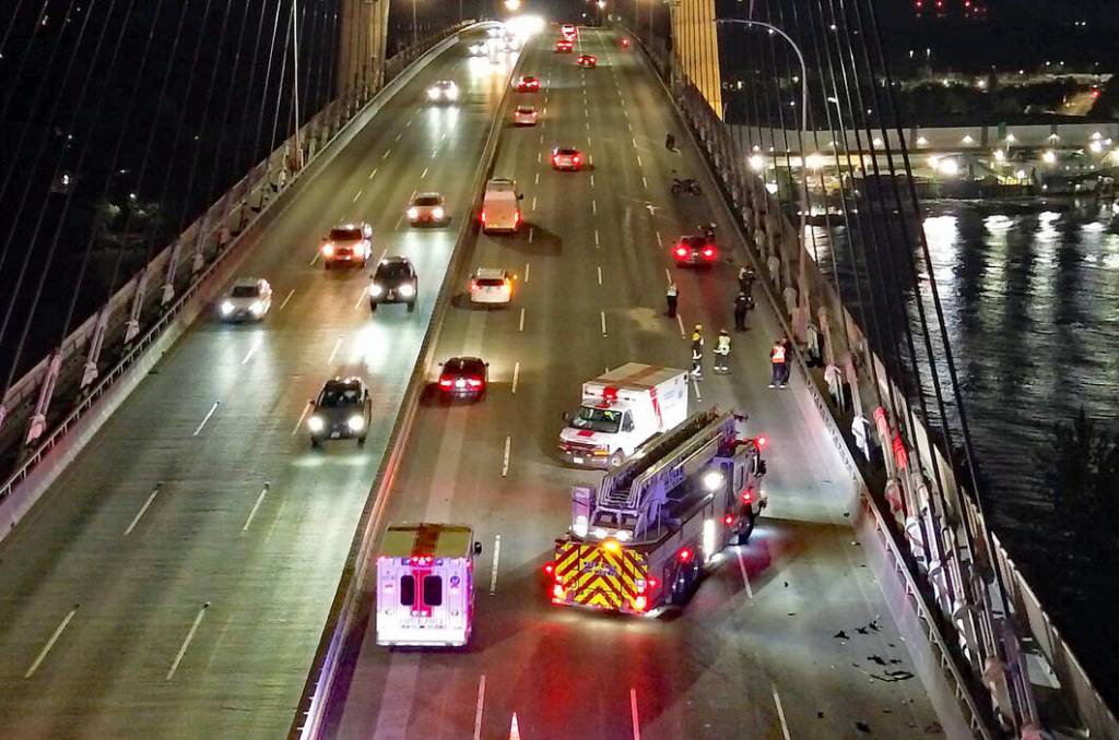 A crash between two motorcycles and a car on the Alex Fraser Bridge sent the two motorcycle riders to hospital with minor injuries Wednesday night (May 6). (1st Due Media photo/Contributed to Peace Arch News)