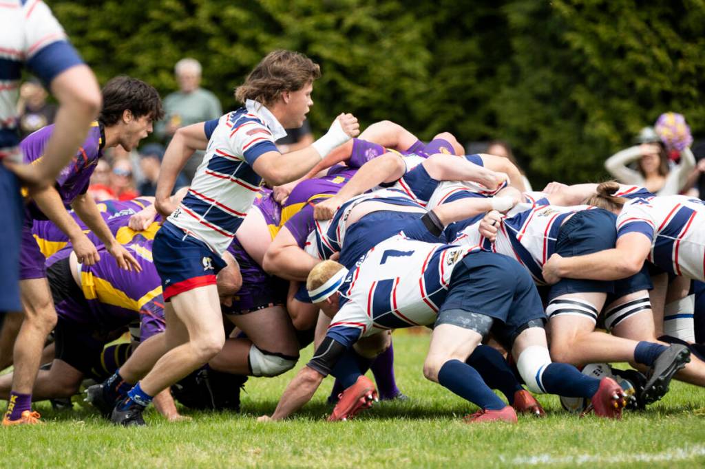 Kelowna Crows (white and blue stripes) in Men&rsquo;s Division 2 action vs. Kamloops Raiders RFC during BC Rugby&rsquo;s senior club finals at South Surrey Athletic Park on Saturday (May 9). Kelowna won 21-15 over the defending champs. (Anna Burns/Surrey Now-Leader)