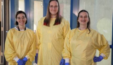 Speech therapist Meaghan Delaney (left) registered nurse Sara Baynes, and speech therapist Marie Shuman are shown wearing reusable isolation gowns. The introduction of reusable gowns has allowed the RJH Renal Unit to eliminate the 30,000 disposable plastic gowns it went through annually. (Courtesy of Island Health)