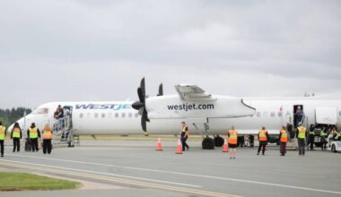Passengers disembark the first nonstop flight from Calgary to Campbell River on May 15. (Robin Grant/Campbell River Mirror)