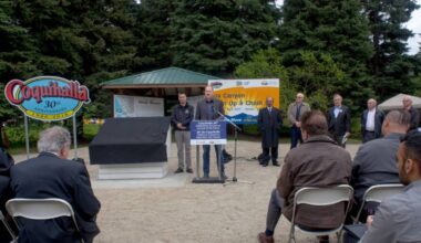 Michael Jacobs (centre) spoke at the ceremony celebration for the 30th anniversary of the Coquihalla being built. (B.C. Government)