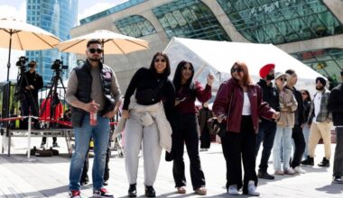 Attendees enjoying the music at the 5X Fest block party in Civic Plaza, Surrey, on Saturday, May 16, 2026. (Anna Burns/ Surrey Now-Leader)