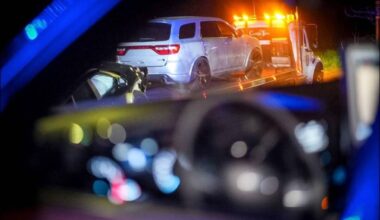 Surrey Police Service taking a car off the road. (Photo SPS).