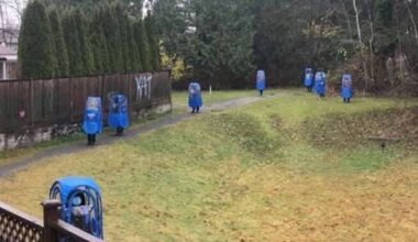 Protesters walked around Guildford neighbourhood in blue bubble suits. (Surrey Now-Leader file photo)