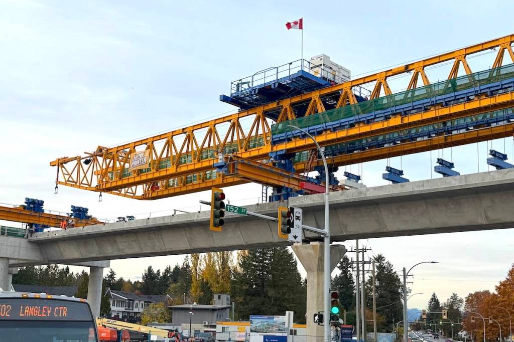 The &ldquo;Surrey Sprinter&rdquo; launching gantry (crane) builds the new Surrey Langley SkyTrain line at the corner of 152 Street and Fraser Highway in Surrey on Nov. 4, 2025. (Tom Zillich photo)