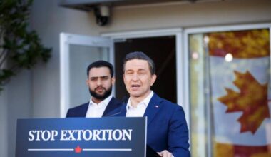 Pierre Poilievre, right, and MP for Abbotsford-South Langley Sukhman Gill speaking at a press conference outside Nirwan Flooring in Surrey on Friday, May 22, 2026. (Anna Burns/ Surrey Now-Leader)