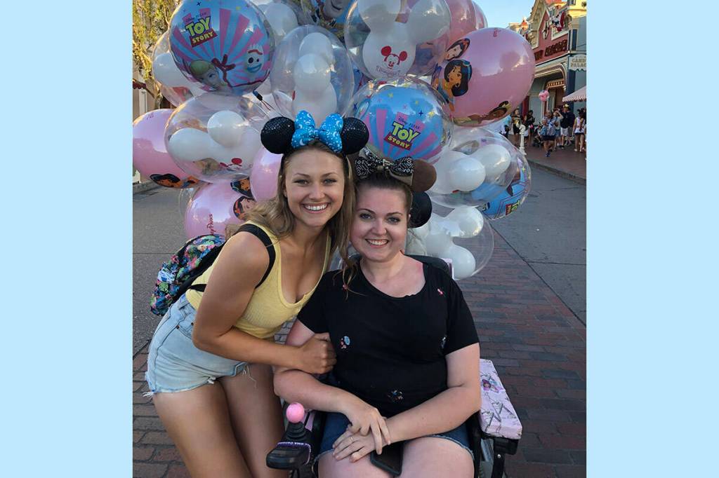 Sisters Amy (left) and Holli Vander Wyk are pictured at Disneyland in 2019. (Submitted by Holli Vander Wyk)