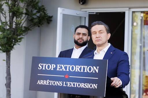 Pierre Poilievre, right, and MP for Abbotsford- South Langley Sukhman Gill speaking at a press conference outside Nirwan Flooring in Surrey on Friday, May 22, 2026. (Anna Burns/ Surrey Now-Leader)