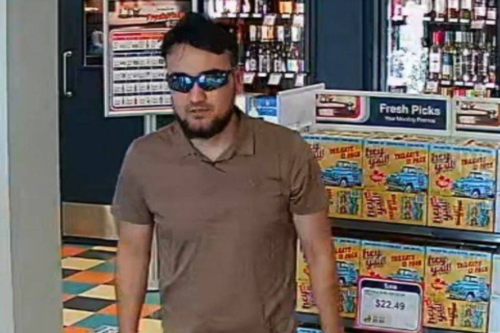 Police are asking for the public&rsquo;s help to identify this man, who allegedly spat on a Langford liquor store employee on May 4 after refusing to show identification. (Photo courtesy of Greater Victoria Crime Stoppers).