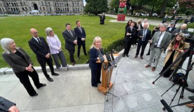 Findlay speaks to the media in Victoria before refusing to take questions and fleeing in an SUV. (Mark Page/Black Press Media)