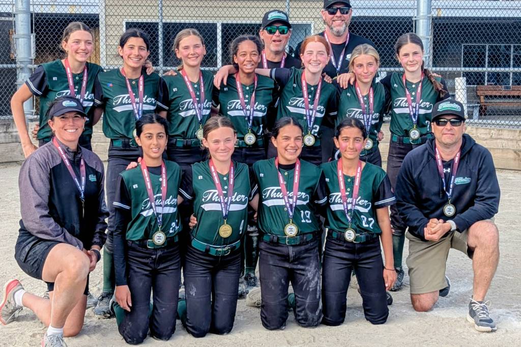 The South Surrey White Rock Minor Softball Association&rsquo;s Thunder 2013A team with their medals after winning the White Rock Renegades Pride and Power Tournament over the May long weekend (May 16-18) at Softball City. (Contributed to Peace Arch News)