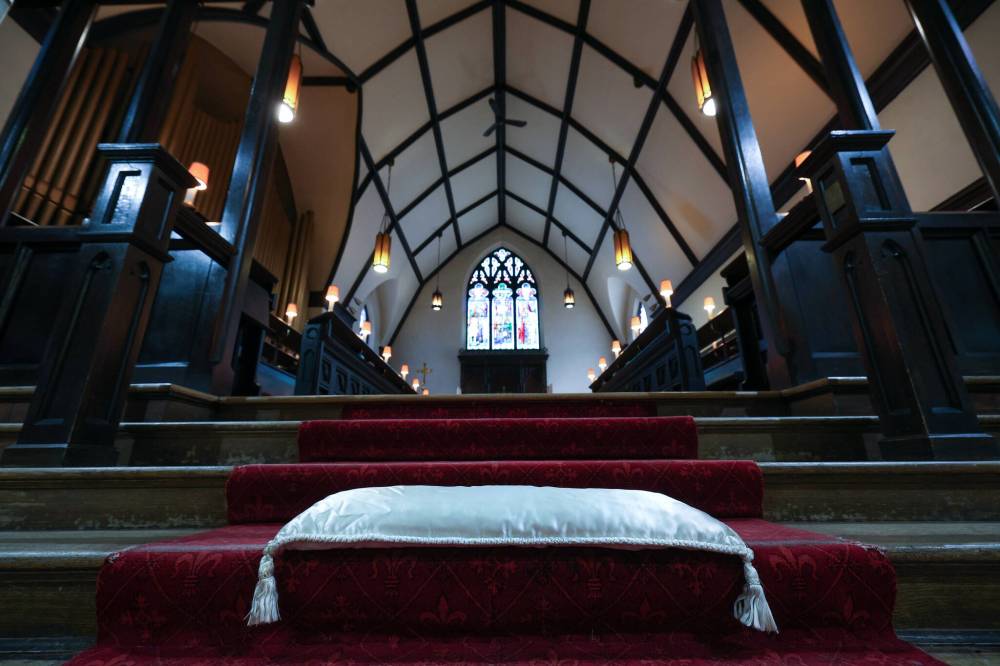 ‘Kneeling cushions’ made of cream-coloured silk, on which the bride and groom kneel side-by-side, are now rarely used for wedding services at All Saints Anglican Church. (Ruth Bonneville / Free Press)
