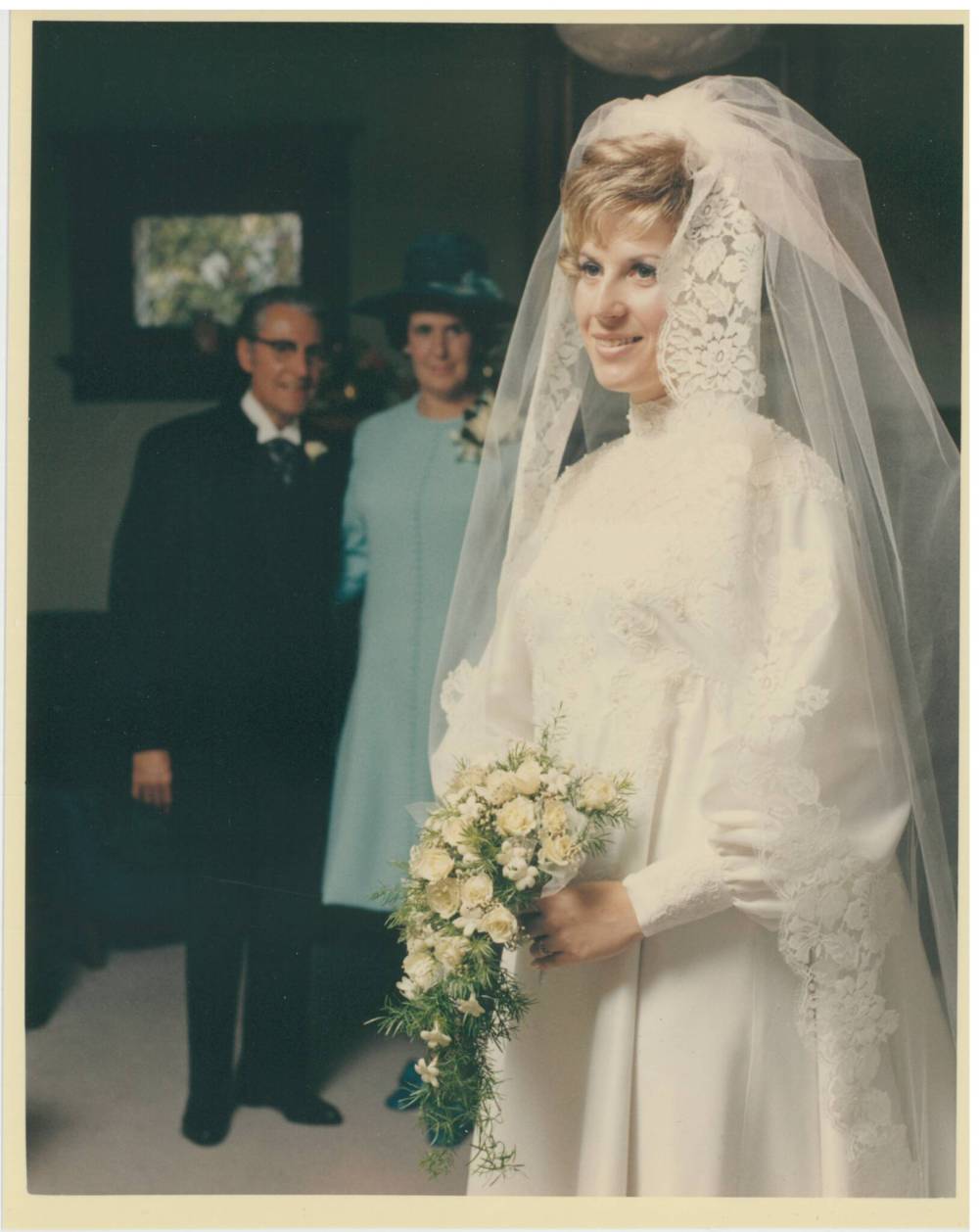 Van Benthem on her wedding day with her parents, Alf and Betty Holbrow. (Supplied)