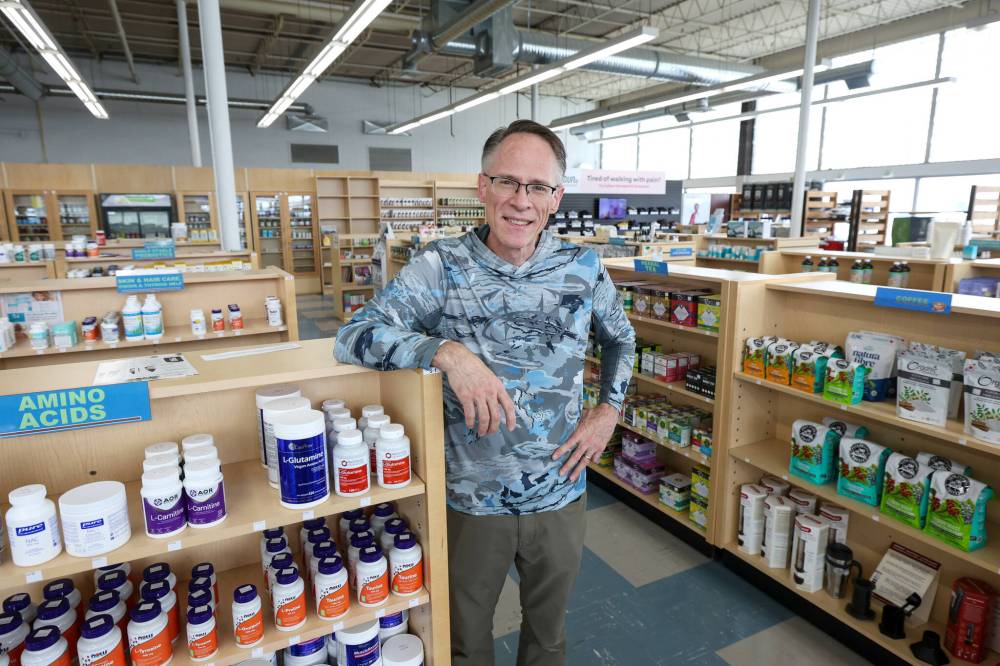 RUTH BONNEVILLE / FREE PRESS
Robert Johnston, the new owner and president of Aviva Natural Health Solutions, at its new store on Wellington Avenue on May 21, 2026. The Winnipeg space also houses GME Clearance Centre and GMissions Cafe.