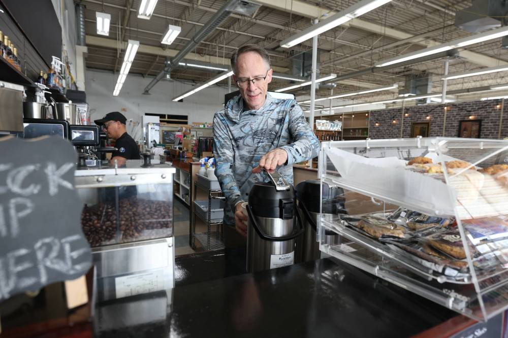 RUTH BONNEVILLE / FREE PRESS
Robert Johnston, the new owner and president of Aviva Natural Health Solutions, at its new store on Wellington Avenue on May 21, 2026. The Winnipeg space also houses GME Clearance Centre and GMissions Cafe.