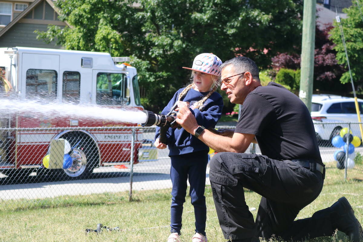 A Langford child is put through her paces at the Millstream Elementary FireSmart event May 30. (Ben Fenlon/Goldstream Gazette)