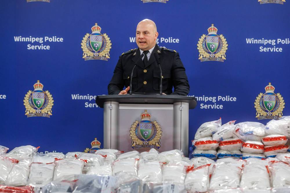 MIKE DEAL / FREE PRESS FILES
Winnipeg Police Service Insp. Josh Ewatski, of the organized crime division, speaks during Wednesday’s news conference announcing the huge drug bust.
