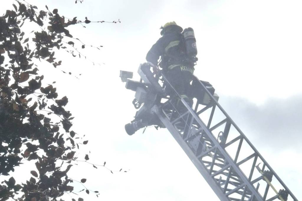 Fire forced the evacuation of a Willoughby housing complex near 208 St. and 77A Ave. on Saturday, May 30. (Dan Ferguson/Langley Advance Times)