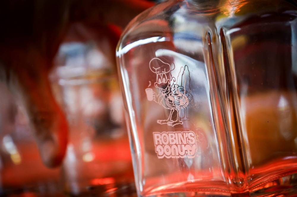 JOHN WOODS / FREE PRESS
Moore is particularly fond of a Robin’s liquor decanter, won by its previous owner at a golf tournament.