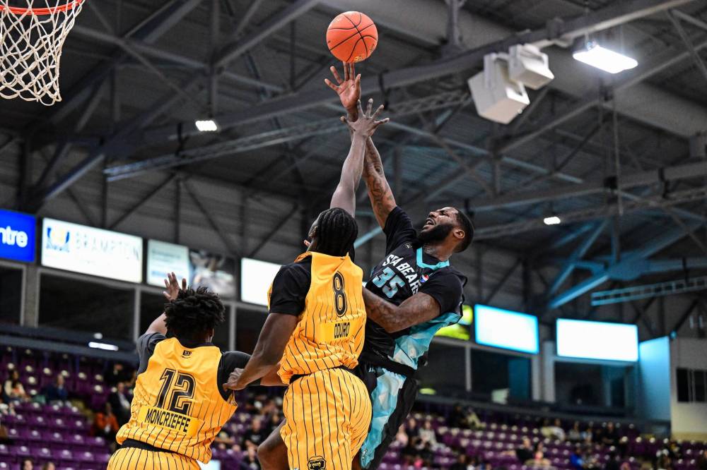 CEBL
Winnipeg Sea Bears centre Jeremiah Tilmon Jr. is met by Brampton Honey Badgers forward Prince Odoro as he puts up a shot.