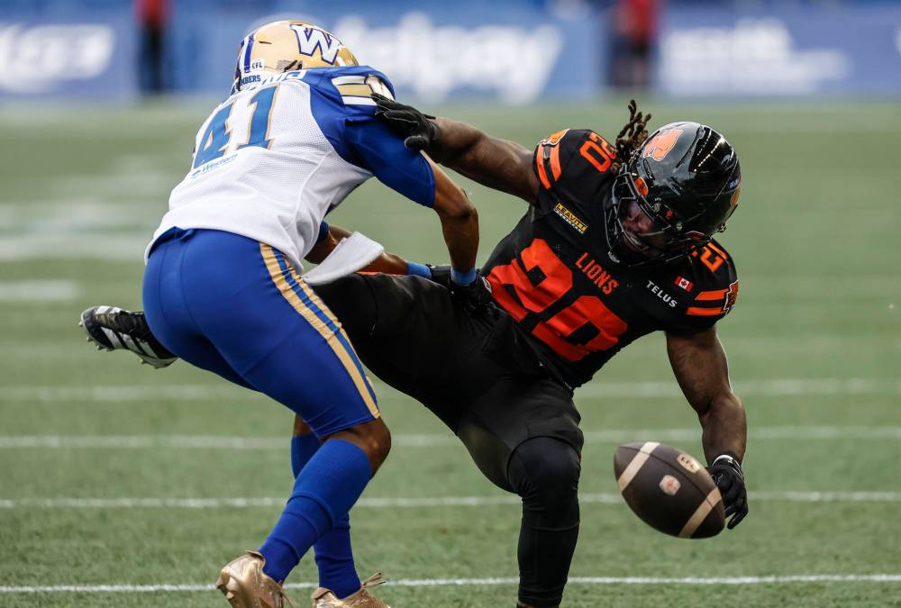 THE CANADIAN PRESS/JOHN WOODS
Winnipeg Blue Bombers' Major Williams (41) defends against B.C. Lions' James Butler (20) during first half CFL pre-season football action in Winnipeg on Friday.