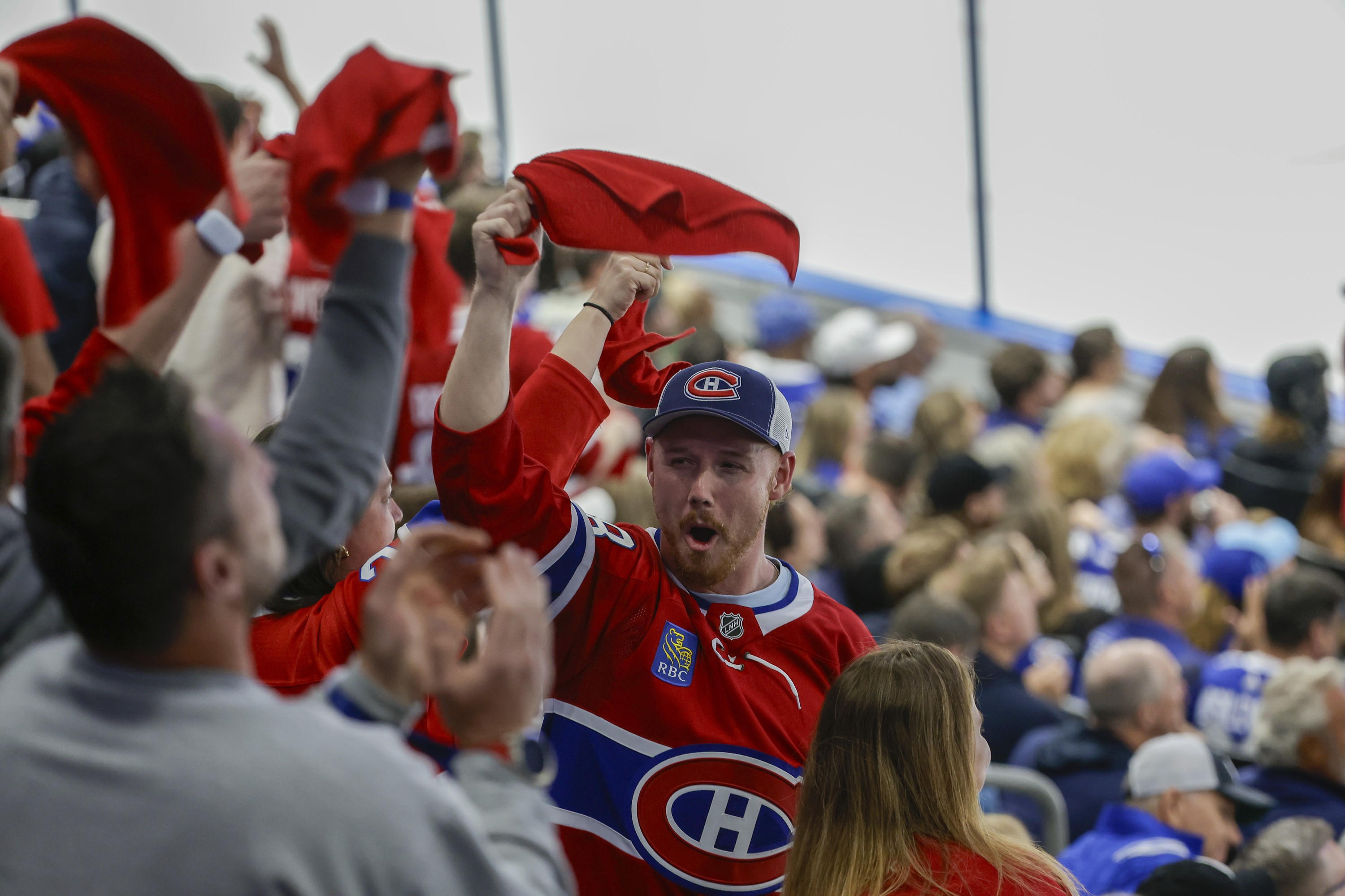Montreal Canadiens fans celebrate a goal