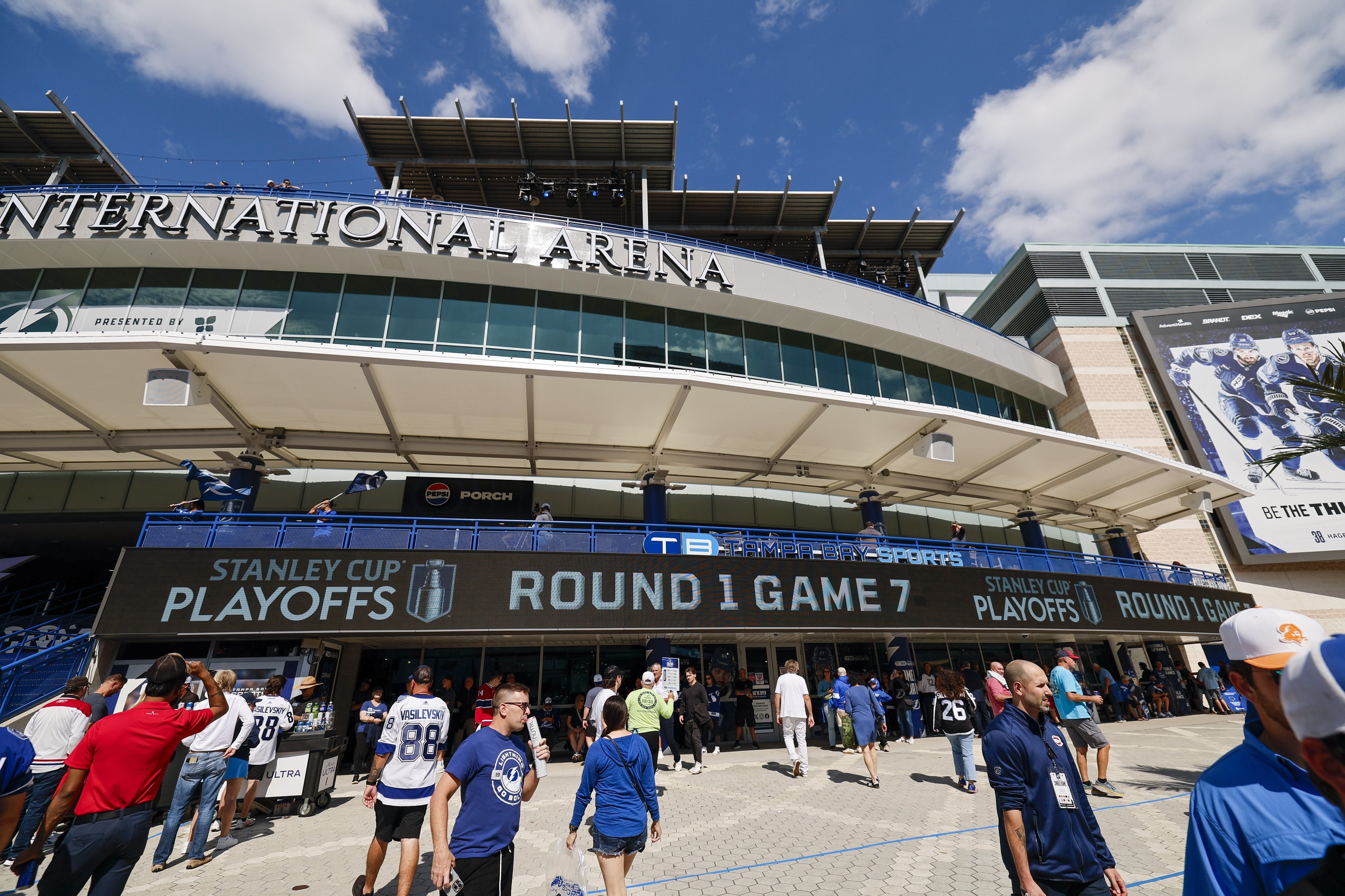 Fans enter Benchmark International Arena ahead of Game 7 of Round 1 of the Stanley Cup playoffs between the Tampa Bay Lightning and the Montreal Canadiens 
