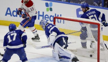 The puck of Montreal Canadiens centre Alex Newhook gets past Tampa Bay Lightning goaltender Andrei Vasilevskiy
