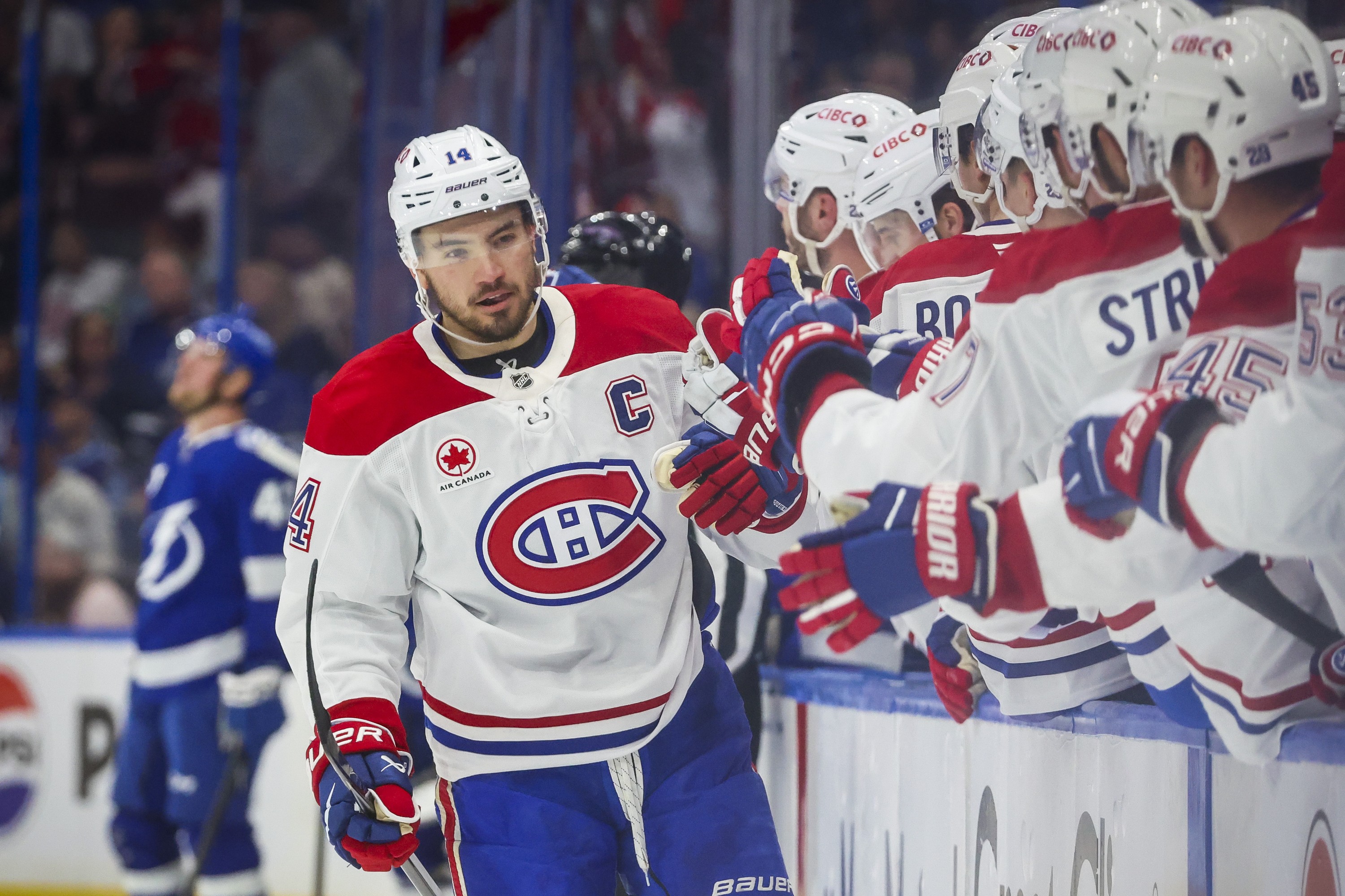 Montreal Canadiens centre Nick Suzuki is congratulated after a goal