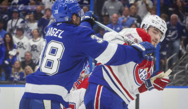 Tampa Bay Lightning left wing Brandon Hagel pushes Montreal Canadiens defenceman Noah Dobson