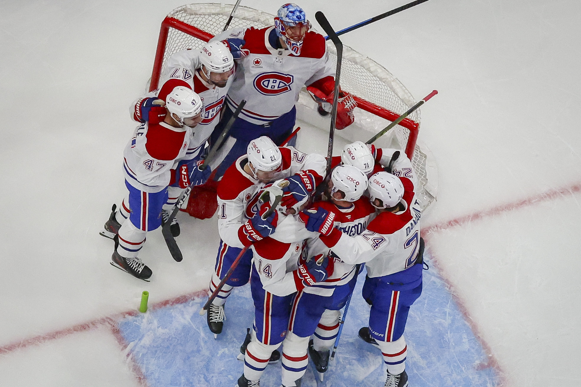 Montreal Canadiens teammates celebrate their win over the Tampa Bay Lightning