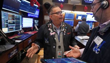 Wall Street drops, oil prices jump