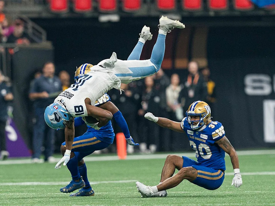  Dejon Brissett #18 of the Toronto Argonauts is upended by Tyrell Ford #30 of the Winnipeg Blue Bombers after making a catch during he first half in CFL action during the 2024 Grey Cup at BC Place on Nov. 17, 2024 in Vancouver, Canada.