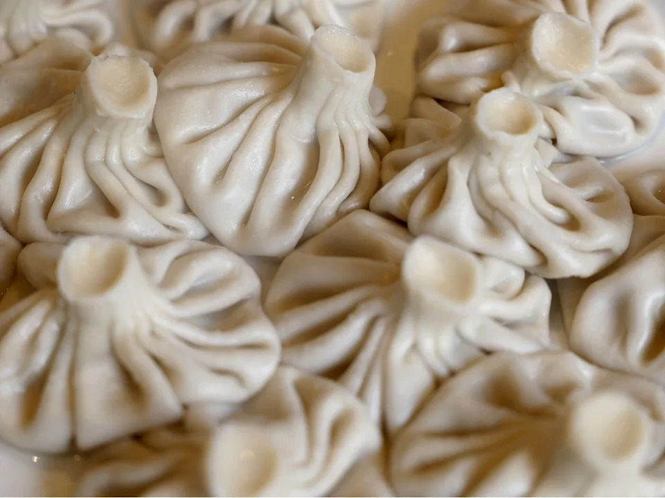 Khinkali are Georgian dumplings filled with beef and pork and broth at Yan’s Restaurant on Murray Street.