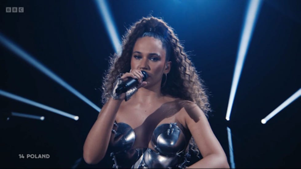 eurovision song contest 2026 alicja poland performance by a singer in an elaborate metallic outfit