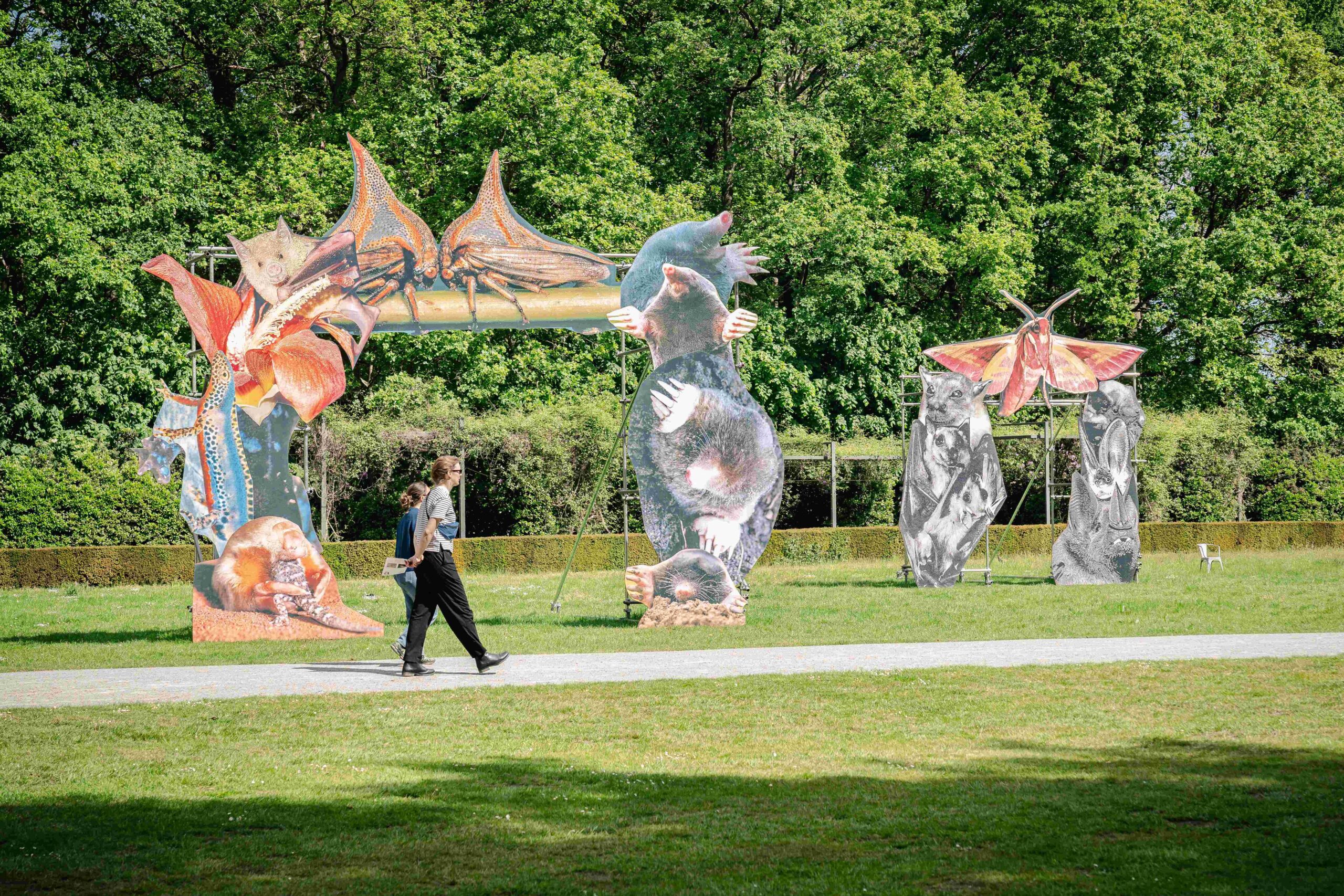 monster chetwynd’s pink salamanders create a playful portal to another world in antwerp - 4