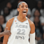 A’ja Wilson (22) reacts after scoring while drawing a foul during the first half against the Dallas Wings.