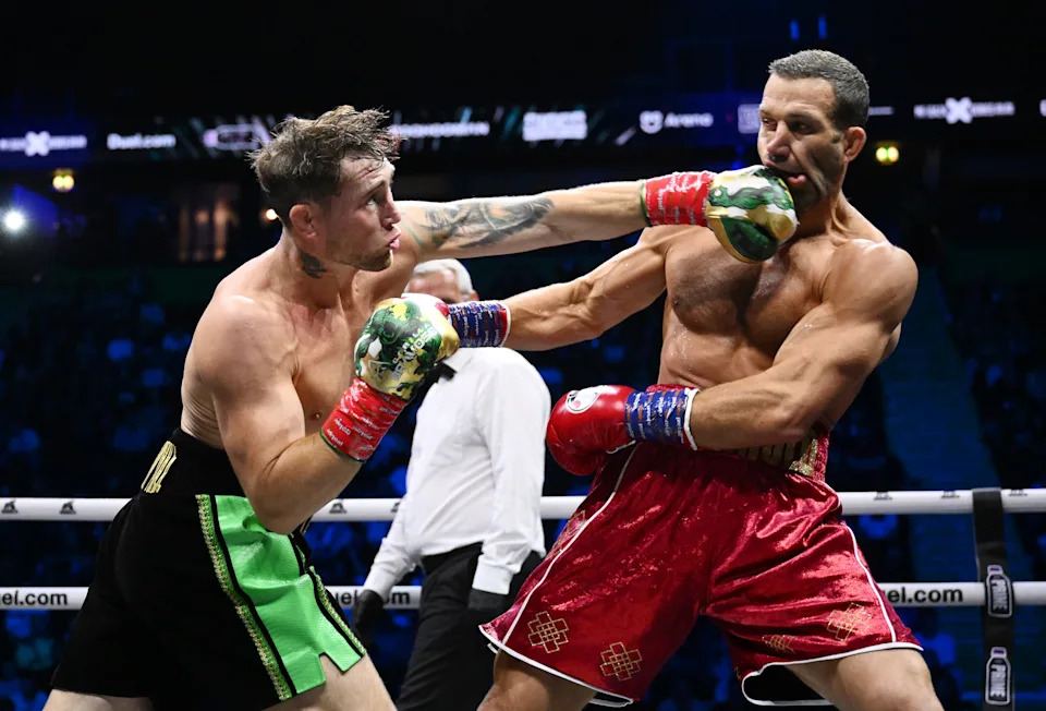 MANCHESTER, ENGLAND - AUGUST 30: Darren Till punches Luke Rockhold during the Light Heavyweight fight between Darren Till and Luke Rockhold during the Misfits 22 - Ring of Thrones fight night at AO Arena on August 30, 2025 in Manchester, England. (Photo by Ben Roberts Photo/Getty Images)