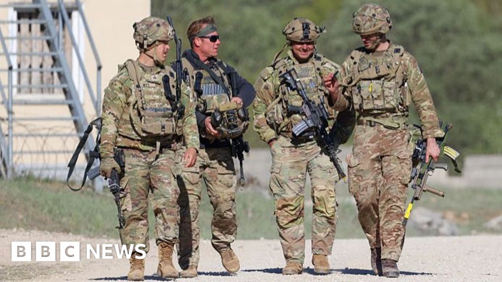 US to cut troop levels in Germany by 5,000 amid Trump spat with Merz - BBC