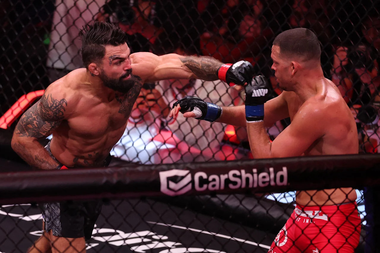 US mixed martial artist Nate Diaz and US mixed martial artist Mike Perry fight during their Double Main Event Welterweight Bout at MVP MMA 1 at the Intuit Dome in Inglewood, California, on May 16, 2026. (Photo by Patrick T. Fallon / AFP via Getty Images)