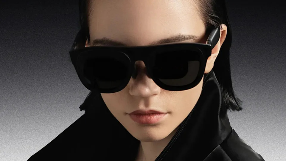 Person wearing Xreal Project Aura smart glasses.