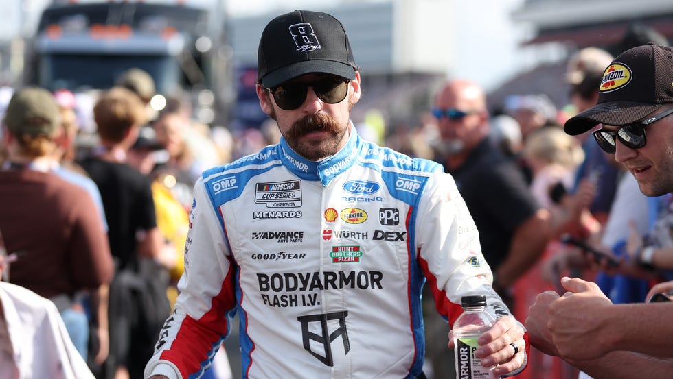 NASCAR Cup Series Coca-Cola 600 concord, north carolina may 24: ryan blaney, driver of the #12 bodyarmor flash i.v. ford, greets fans on the grid prior to the nascar cup series coca cola 600 at charlotte motor speedway on may 24, 2026 in concord, north carolina. (photo by krista jasso/getty images)